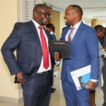 PS Korir (R) chatting with LSK President Eric Theuri after a stakeholders meeting (FILE)