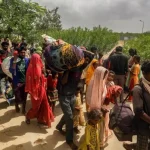 More than 100,000 people in India and Pakistan have been evacuated from the path of a fierce cyclone