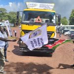 UFAA CEO John Mwangi (left) and Murang’a East Deputy County Commissioner Thomas Nyoro flag off a truck for a roadshow campaign on services offered by the authority. Photo by Bernard Munyao