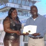 KAA Acting Managing Director (MD) Henry Oyoye (right) during the awards ceremony held in Kisumu. Photo by Chris Mahandara.