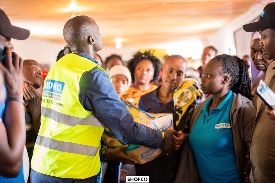 Shining Hope for Communities (SHOFCO) staff distributing foodstuffs to flood victims in Matahre on Thursday, April 25, 2024.