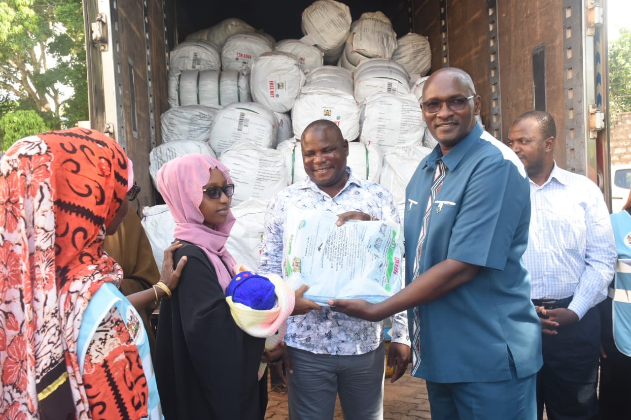 Kwale County Commissioner Stephen Orinde issued mosquito treated nets to residents during the flagging off ceremony of treated mosquito nets to area residents.