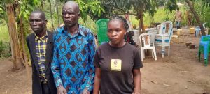 Dennis Kaunya (centre) and his daughter Lorine Oyakapel during a press conference