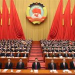 Xi Jinping delivers a report to the 20th National Congress of the Communist Party of China on behalf of the 19th CPC Central Committee at the Great Hall of the People in Beijing.