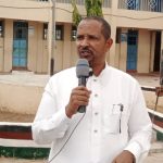 Garissa Township MP Dekow Mohamed speaking during the graduation ceremony at Al_Amaar School in Iftin ward. He called on the local authorities and parents to work together to end the rising crime in Garissa Town