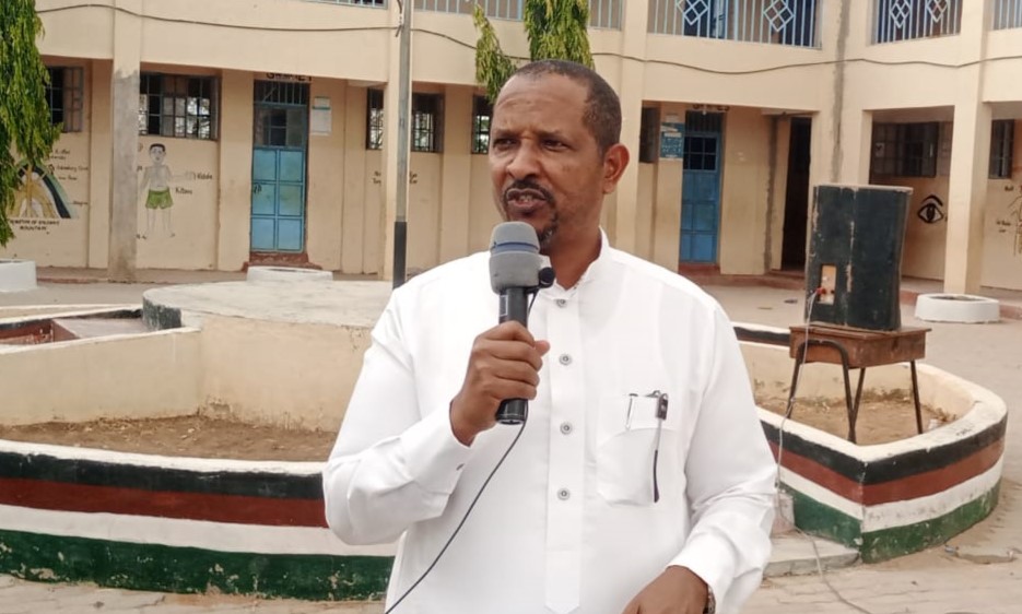 Garissa Township MP Dekow Mohamed speaking during the graduation ceremony at Al_Amaar School in Iftin ward. He called on the local authorities and parents to work together to end the rising crime in Garissa Town