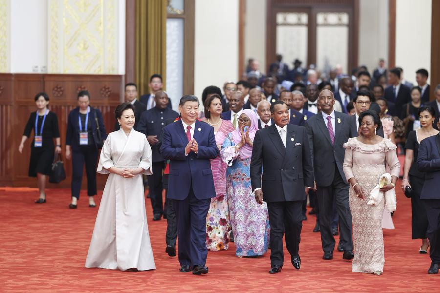 Chinese President Xi Jinping and his wife Peng Liyuan, together with international guests attending the 2024 Summit of the Forum on China-Africa Cooperation (FOCAC), enter the venue for a welcome banquet held at the Great Hall of the People in Beijing, capital of China, Sept. 4, 2024. (Xinhua/Liu Bin)