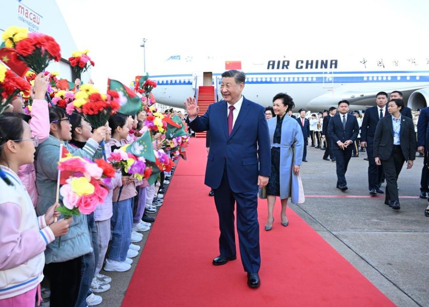 Chinese President Xi Jinping, also general secretary of the Communist Party of China Central Committee and chairman of the Central Military Commission, and his wife Peng Liyuan greet the welcoming crowd in Macao, south China, Dec. 18, 2024. (Xinhua/Xie Huanchi)