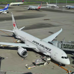 A Japan Airlines passenger jet at Tokyo International Airport at Haneda. Japan Airlines reported a cyber attack on Thursday causing flight delays. Photo/AFP